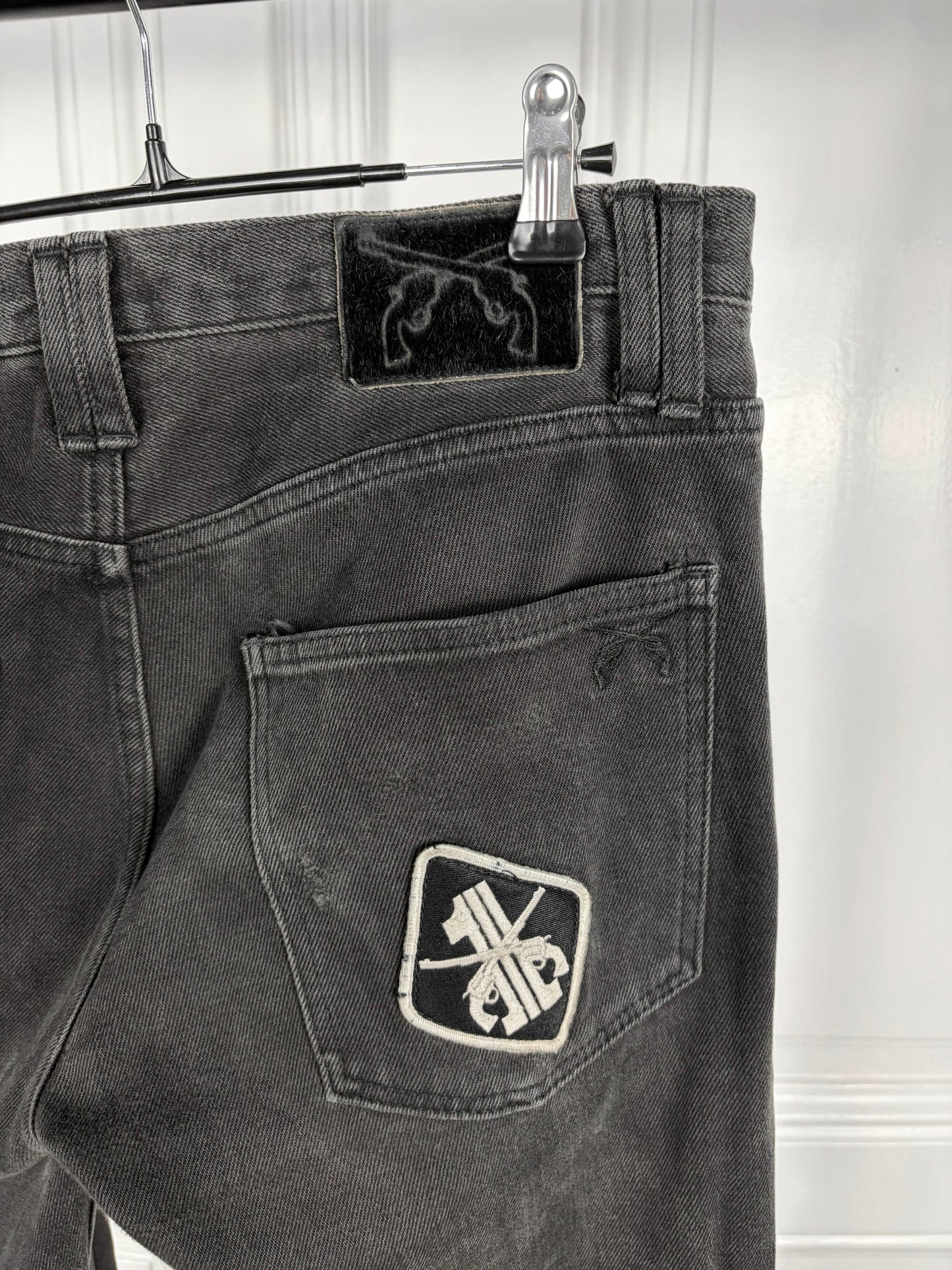 Roar patched denim
