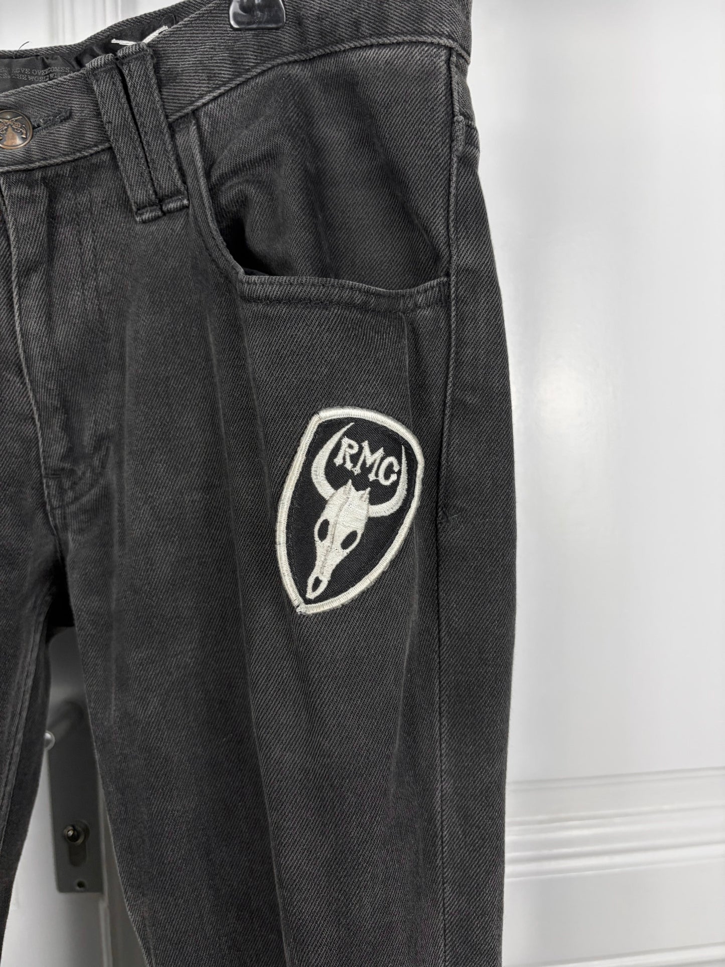 Roar patched denim