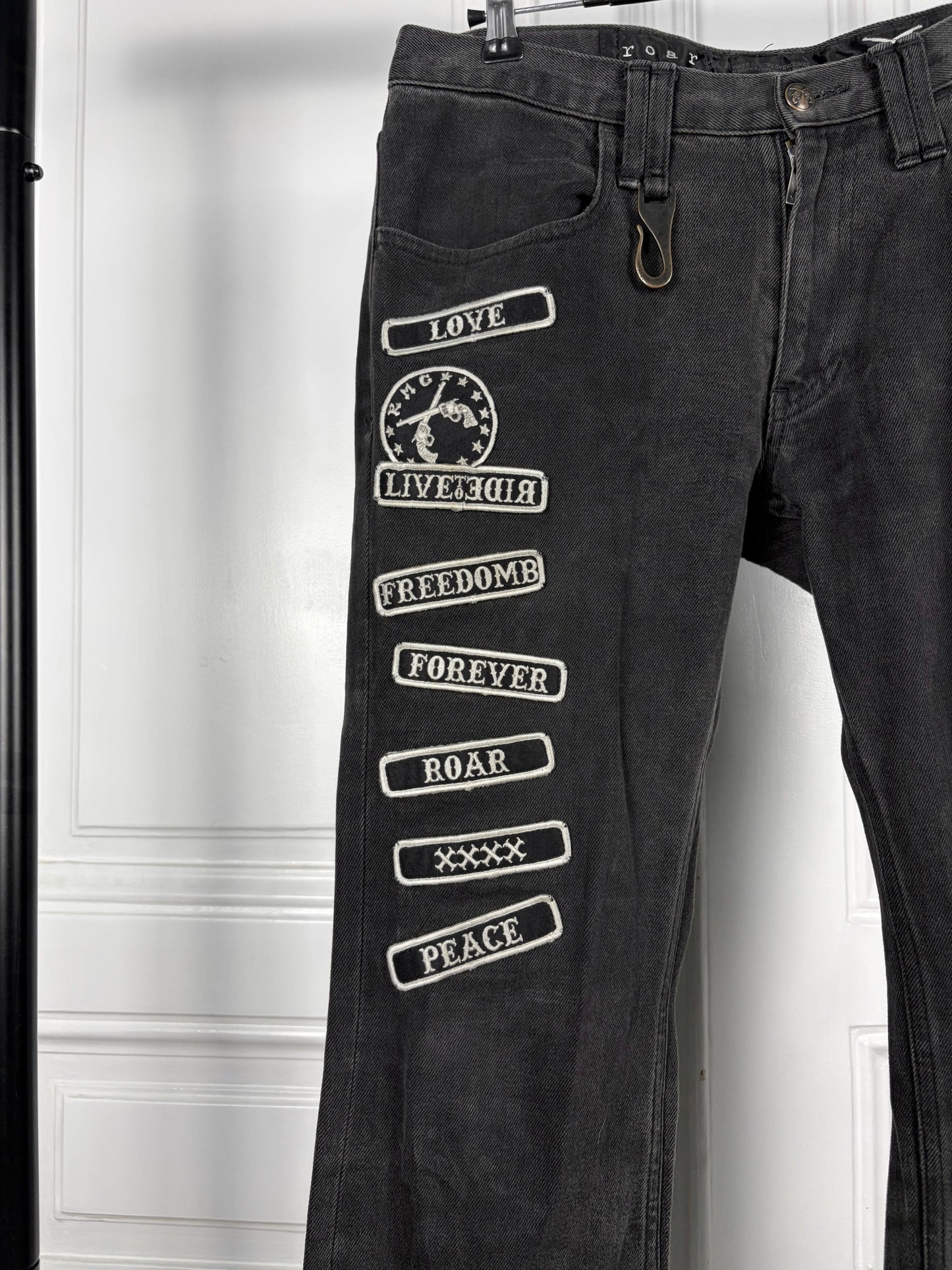 Roar patched denim